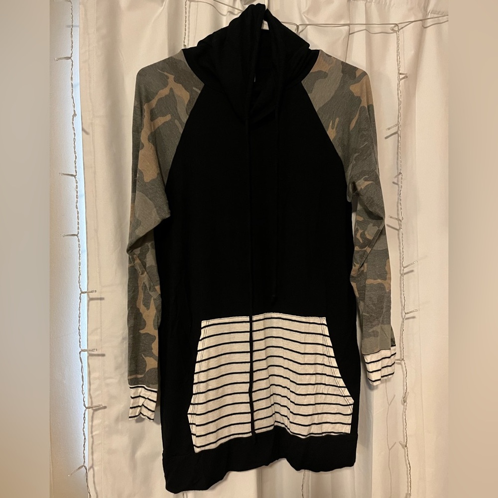 Camo, black and white striped, and black long sleeve with pockets